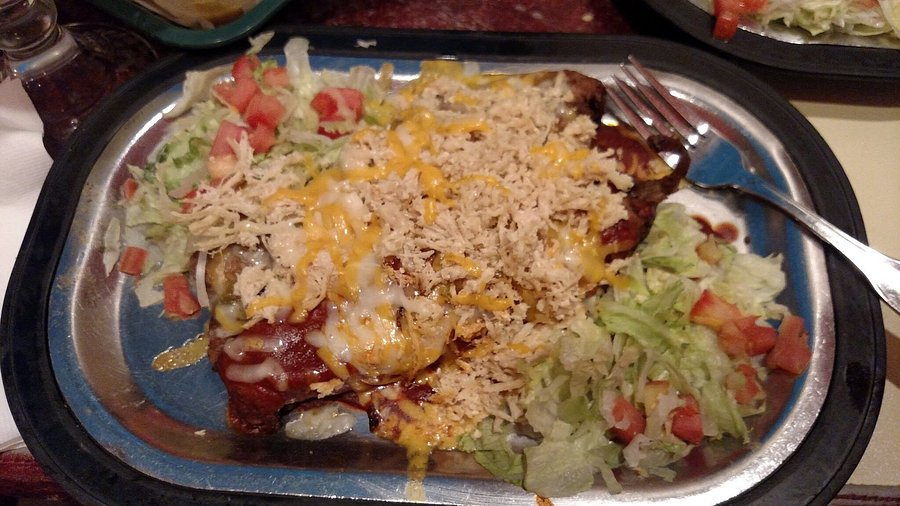 Si Señor Restaurant signature dishes Mole EnchiladasSirloin TacosTacos Al Pastor